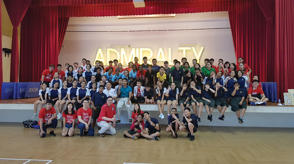 Group of students and adults posing after VIA.